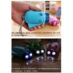 可爱猪手压双灯手电筒